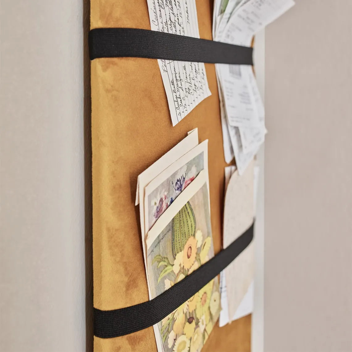 Padded Wall Boards Accessories - Elastic 15 cm black elastic on yellow mustard panel Decormania UK